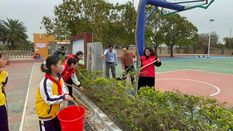 珠海市斗門區(qū)白藤湖幸福小學與珠海市環(huán)保與生態(tài)協會攜手共添新綠15.png